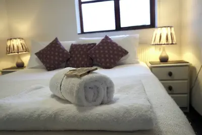 Image de Gather, Celebrate, and Soak in the Views at Ollie’s Lodge sleeping 8.