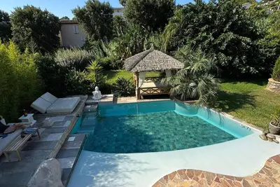 Image de Maison/rez de jardin intime-verdoyant-calme-piscine à (parfois) partager-parking