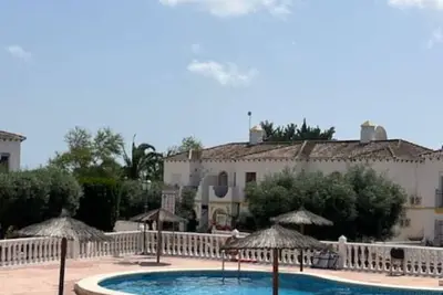 Image de Beautiful renovated apartment -access to 4 pools