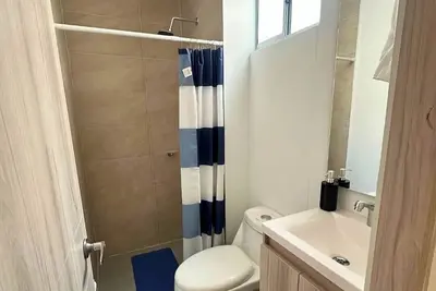 Image de Apt 100 meters from the beach, ideal to rest with your family or couple.