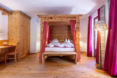 Image de \"Alm-Suite\" with bathtub, shower, Wc (from 7 nights) - Nature and wellness hotel