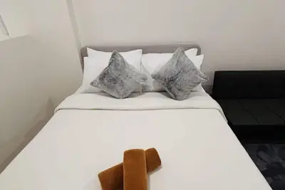 Image de Comfort-First Studio Living at Wv Towers