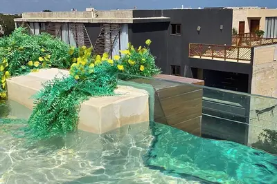 Image de Condo-Hotel 15 min from Tulum Ruins & Beach