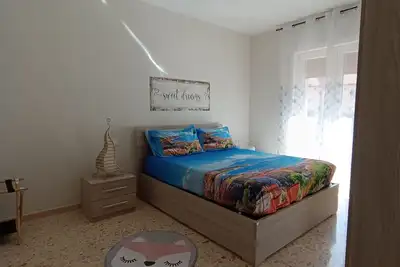 Image de 7 km from Naples, away from the chaos, cozy kids and pets friendly accommodation!