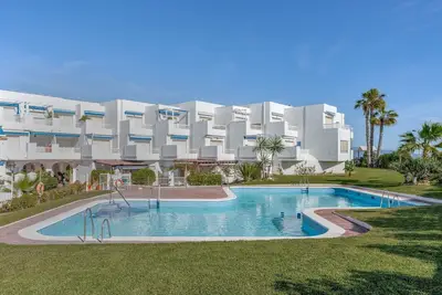 Image de Appartement 'Brisa y Mar' avec piscine partagée, terrasse privée et Wi-Fi