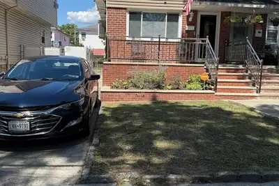 Image de Peaceful cozy 3-bedroom house with Ac in Queens.