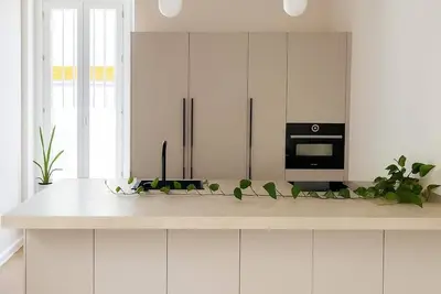 Image de Great patio house! Light and tranquility in the center of the city