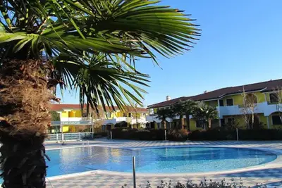 Image de Bel appartement avec piscine partagée