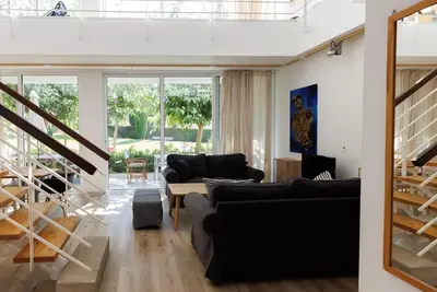 Image de Eupraxia | Three-Bedroom Apartment, Art by PraXis Apartments