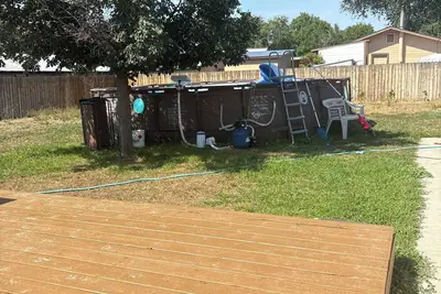 Image de Charming house in welcoming Kuna with Ac and a pool! New deck huge back yard!