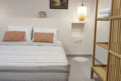 Image de Charming renovated apartment with kitchen and garden in lovely ΜΥΤΗΛΙΝΙΟΙ withAC