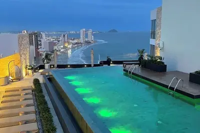 Image de 2-bedroom condo in serene Mazatlán with Ac, fitness room. Live it up