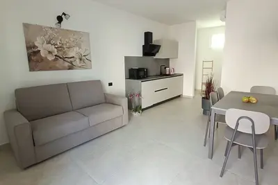 Image de The land. Accommodations 5 minutes to Gardaland, in the quiet among vineyards and olive trees.