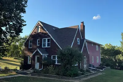 Image de Perfect 9-bedroom house with lots of land