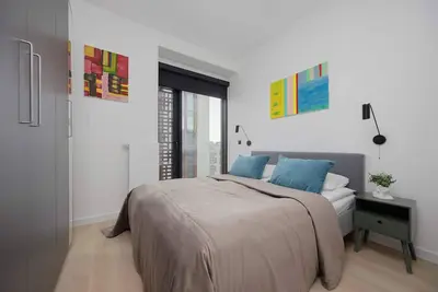 Image de Prosta 69c | Warsaw | Prestigious Apartment | Parking Space | Air Conditioning | Workspace | Near the Center