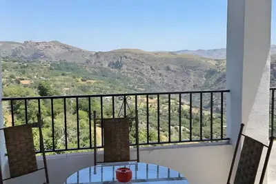 Image de Appartement 'Chaparra Pitres Apart Atalbéitar' avec vue sur la montagne, piscine partagée et Wi-Fi