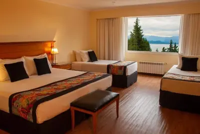 Relax in a Spacious Room with Breakfast and Nahuel Huapi Views
