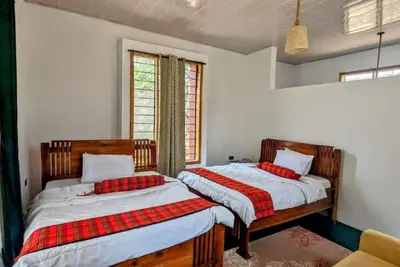 Image de Double G safaris and Camp Mikumi - Luxury Triple Room 2