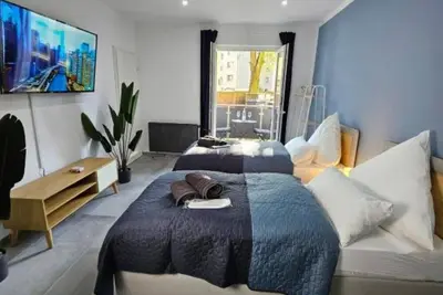 Image de Modern Homes - Fully equipped apartment - Balcony - Hotel beds - 4k Tv - WiFi ground floor