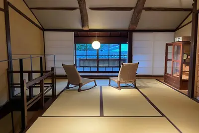 Image de One-room suite townhouse in an important traditional building preservation district with bedrock bath & open-air bath Please stay in the kitchen and projector.