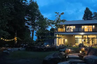 Image de forest chalet Nideli| 4 ensuite bedrooms | Spa & Sauna | cozy backyard & bonfire