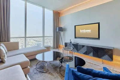 Image de bnbme | Luxury Damac Apt near Kingdom Tower | Pool & Gym