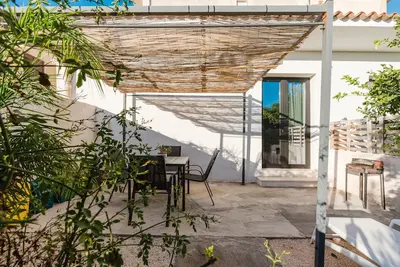 Image de Appartement 'Vento E Salsedine Grecale' avec Jardin Privé, Wi-Fi et Climatisation