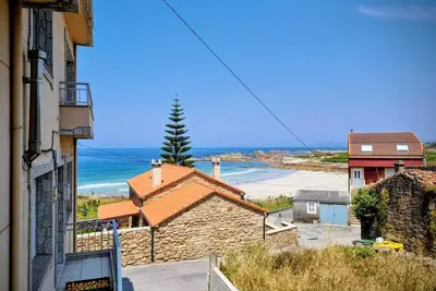 Image de Ideal house to share with family or friends, next to the beach and the mountains.