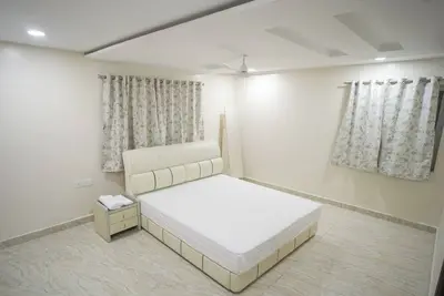 Image de Stay Pride Service Apartments - Ac Rooms in Vijayawada - Family & Business Stays