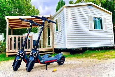 Image de Mobilhome 3 chambres 6 pers Tv Wifi parcelle proche animations + 2 Trottinettes