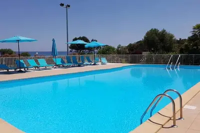 Image de Appartement '4 Personne' avec piscine partagée, Wi-Fi et climatisation