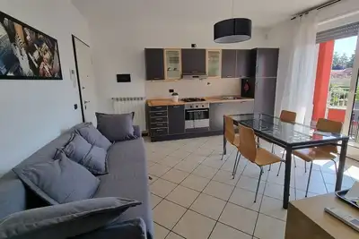 Image de Cozy one-bedroom apartment with large balcony 10 minutes from Milan Malpensa. WiFi.