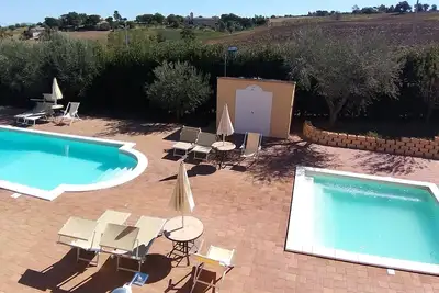 Image de Vacation home of 7 apartments garden, swimming pools common lounge. Suitable for groups