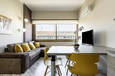 Image de Modern 50 sqm apartment on the 7th floor of a building with elevator (not suitable for disabled guests), ideal for 4 people. Fully equipped with all comforts, it offers a cozy stay in the heart of Catania, just steps from Stesicoro Metro and Corso Sicili