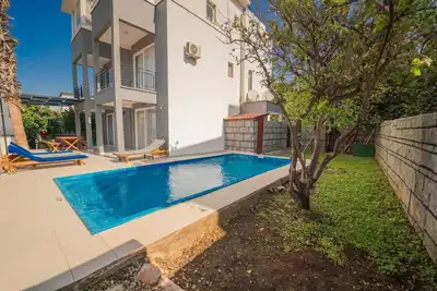 Image de Unutulmaz Zamanlar YAŞAYABİLECEĞİNİZ GÜN Batimi Ve DENİZ Manzarali\nPATARA EVLERİ