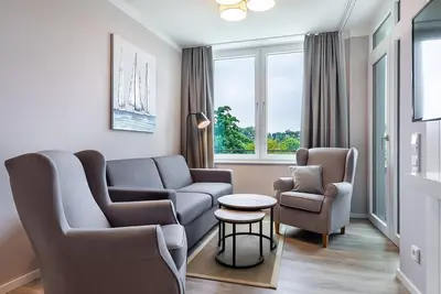 Image de Comfortable apartment with covered balcony and wellness area in Travemünde