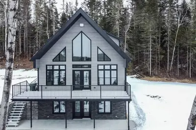 Image de Melsy | Bord de lac | Tavata Chalets