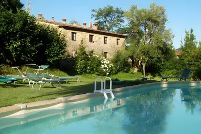 Image de Villa 'Aranci' avec piscine partagée, jardin privé et Wi-Fi