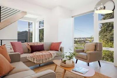 Image de 7br Chic Retreat • Twin TownHomes w/ Rooftops