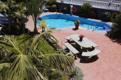 Image de Appartement El Médano avec vue imprenable sur la piscine