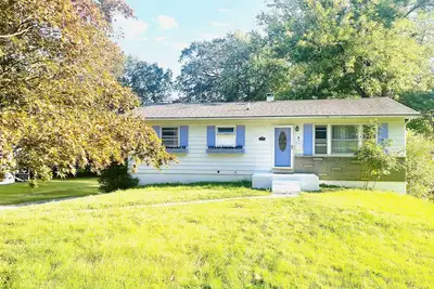 Image de Sunkissed Escape  Bright Sunroom + Hammock Fun