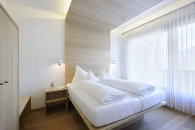 Image de Chambre 'Pazeider Suite Meranblick 302' avec vue sur la montagne, Wi-Fi et climatisation