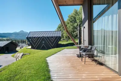 Image de Appartement 'X-Camping Lodge 3' avec vue sur les Dolomites, terrasse privée et Wi-Fi