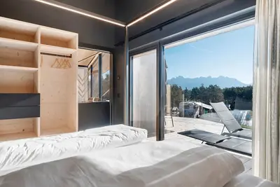 Image de Appartement 'X-Camping Lodge 5' avec vue sur les Dolomites, terrasse privée et Wi-Fi