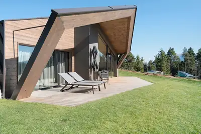 Image de Appartement 'X-Camping Lodge 7' avec vue sur les Dolomites, terrasse privée et Wi-Fi