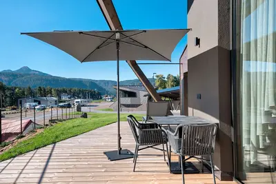 Image de Appartement 'X-Camping Lodge 8' avec vue sur les Dolomites, terrasse privée et Wi-Fi