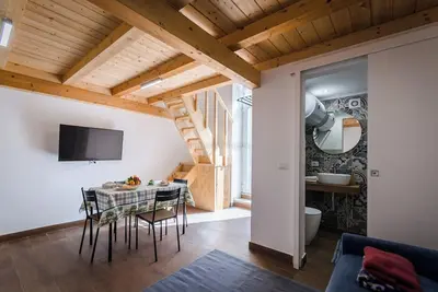 Image de Casa Gloria - Cozy loft-style apartment in Syracuse, central, ground floor