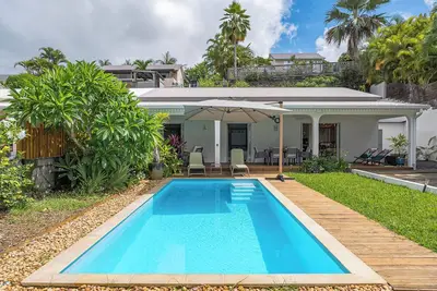 Image de Villa classée 5 étoiles avec piscine, cuisine d'été et vue sur océan