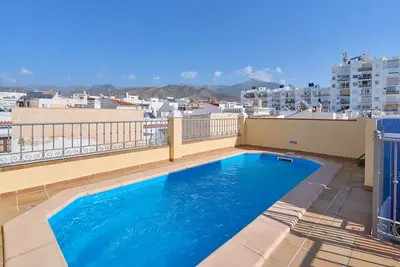Image de Appartement 'Penthouse avec piscine privée' avec vue sur la montagne, Wi-Fi et climatisation