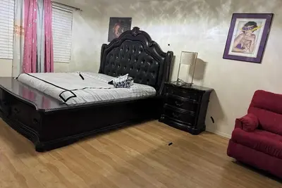 Image de Spacious 5-bedroom house -A place to call home with 5 tvs!